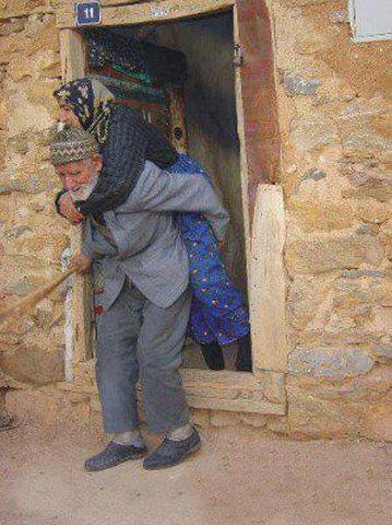 Man helping his wife